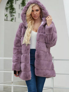 Manteau pelucheux en fausse fourrure