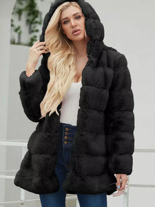 Manteau pelucheux en fausse fourrure